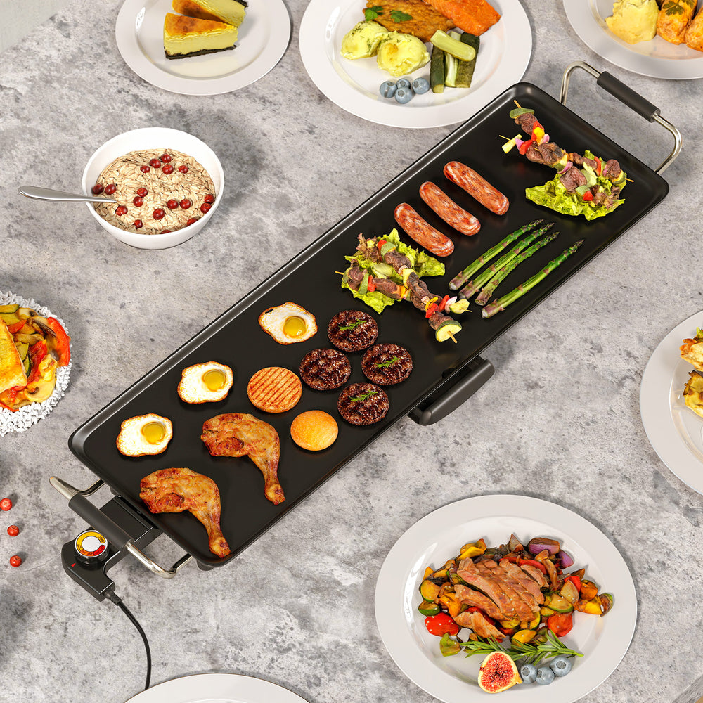 Large 27-inch electric griddle with nonstick surface, cooking various foods for gatherings, featuring adjustable.