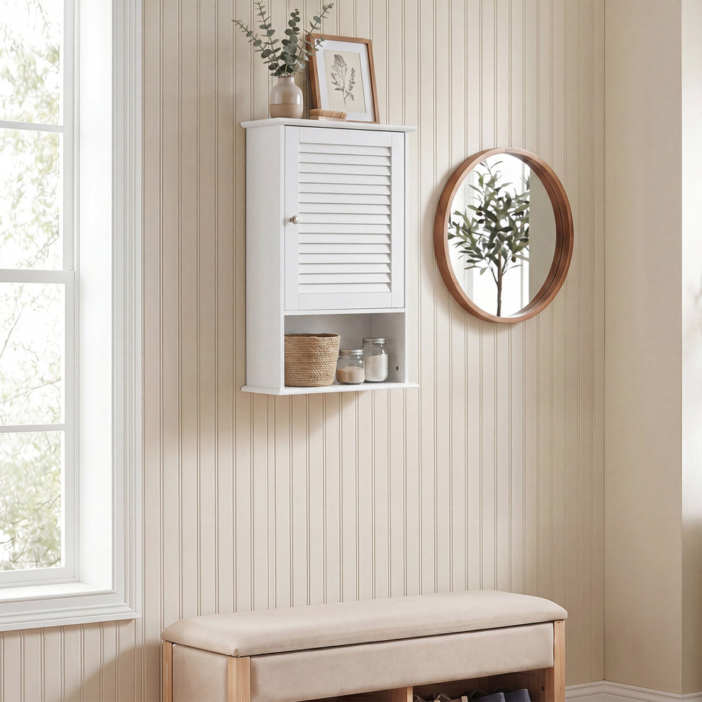 Wall-mounted bathroom storage cabinet in white with adjustable shelves, ideal for organizing small spaces and enhancing decor.