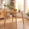 Square bamboo dining table for 2-4 people with a natural finish, perfect for compact spaces and mid-century decor.