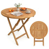 Round 27.5" outdoor folding dining table made of sturdy teak wood with a slatted tabletop, ideal for small spaces.