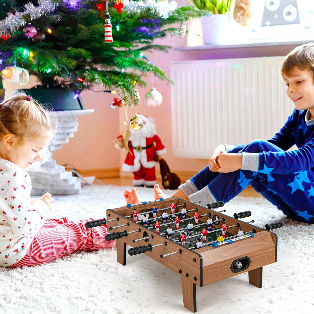 Mini 27 Inch foosball table with ergonomic handles, perfect for kids' parties and group activities.