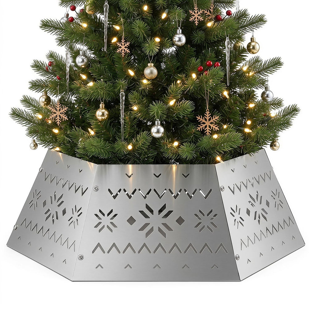 Metal hexagonal Christmas tree collar in silver, featuring intricate designs, fits up to 10 ft trees and hides stands.