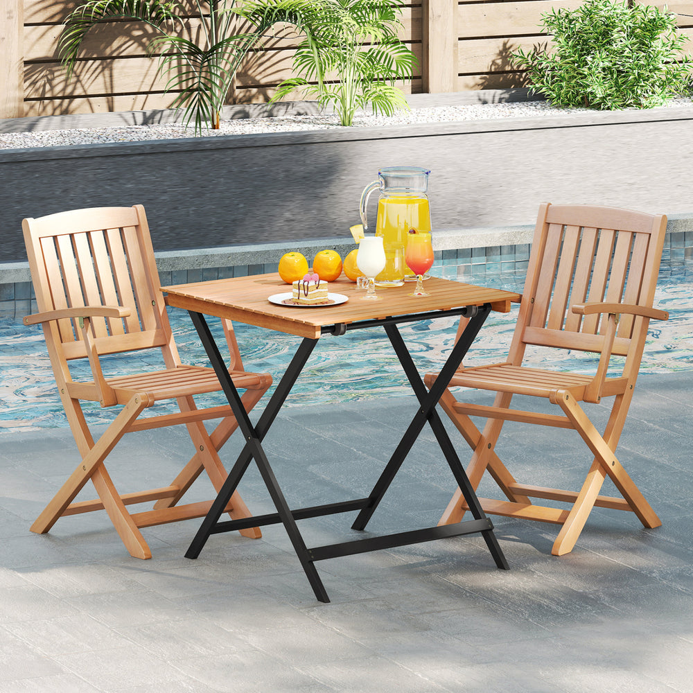 28-inch patio folding square table with slatted acacia wood top, paired with two folding chairs for outdoor dining.