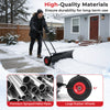 29-inch heavy-duty metal snow pusher with large rubber wheels and adjustable handle for efficient snow clearing.
