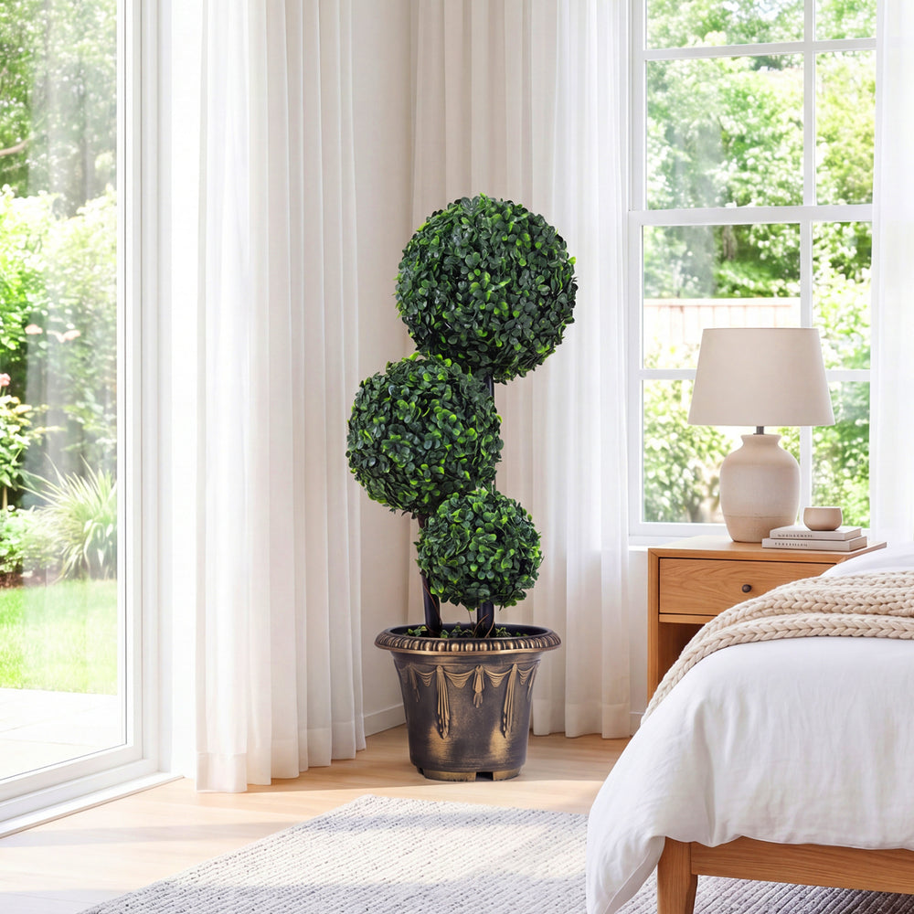 Artificial boxwood topiary tree with triple ball design, 29 inches tall, perfect for indoor decor by windows.