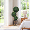Artificial boxwood topiary tree with triple ball design, 29 inches tall, perfect for indoor decor by windows.