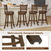 Close-up of the protective foot pad on a brown swivel barstool, ensuring stability and preventing floor scratches.