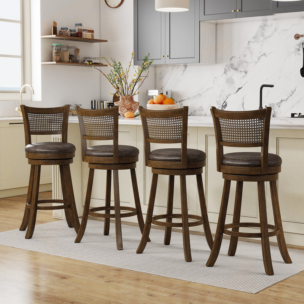 Set of 2 brown swivel counter height barstools with rattan backrest, ideal for kitchen islands and dining areas.