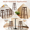 Set of 2 walnut 29" swivel bar stools with footrests, ideal for dining room, balcony, or living room use.
