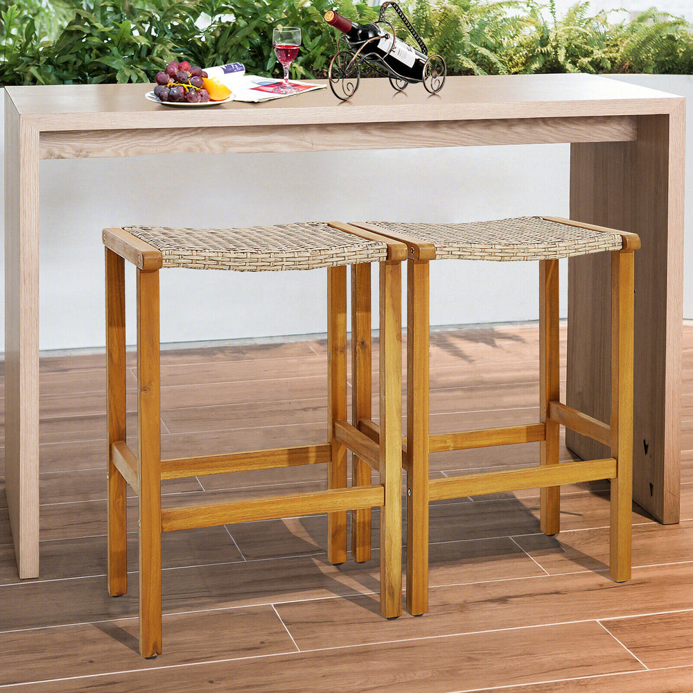 Set of 2 patio wood bar stools with acacia wood and PE rattan, featuring ergonomic seats for backyard or poolside use.
