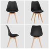 Set of 4 black mid-century modern dining chairs with PU seats and beech wood legs, perfect for kitchen or living room.