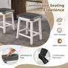 Set of 2 dining bar stools with acacia wood frame, padded waterproof seat, and footrests for kitchen or dining room use.