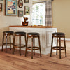 Set of 2 29-inch swivel bar stools in walnut color with leather padding, perfect for kitchen or pub use.