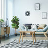 4 feet artificial fiddle leaf fig tree in decorative planter, perfect for indoor decor with natural-looking leaves.