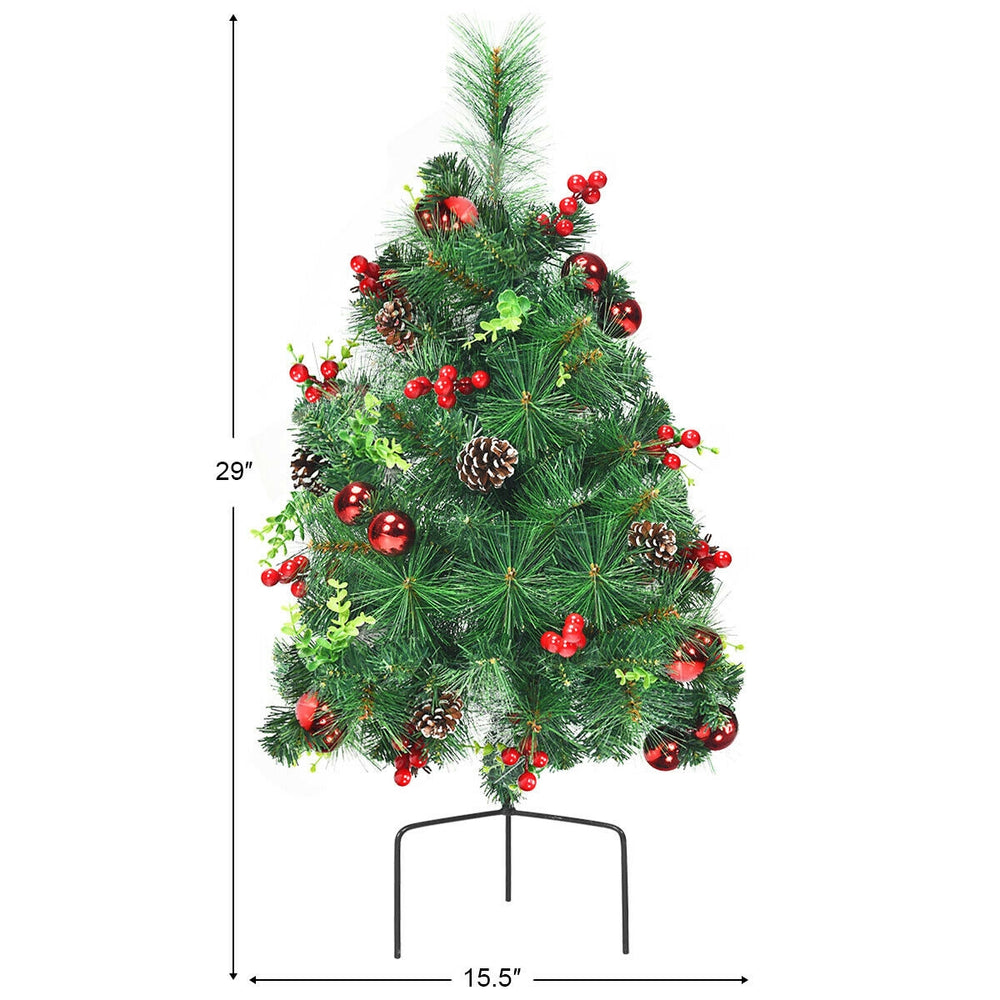 29-inch battery-powered pre-lit Christmas tree with deep green leaves, ornaments, and a sturdy metal stand for festive.