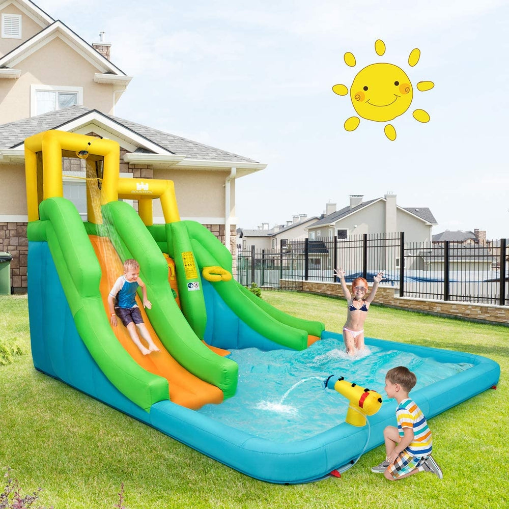 Inflatable water park with double slides, splash pool, climbing wall, and water cannon for outdoor summer fun.