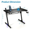 Height adjustable gaming desk with blue LED lights, carbon fiber surface, and Z-shaped legs for stability.