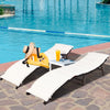 Folding patio lounger chairs with beige cushions by the pool, perfect for sunbathing and outdoor relaxation.