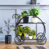 Two-tier heavy duty metal flower cart plant stand showcasing vibrant potted plants with a circular design and.