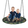 Two children sitting on a 40-inch flying saucer tree swing made of weather-resistant fabric, perfect for outdoor play.