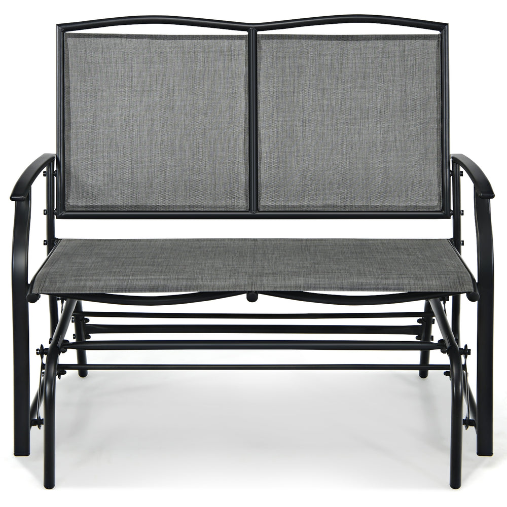 Gray iron patio rocking chair with a durable metal frame, designed for two, perfect for outdoor relaxation.