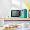 Retro green 0.9 Cu.ft countertop microwave oven with LED display, ideal for small spaces like apartments and offices.