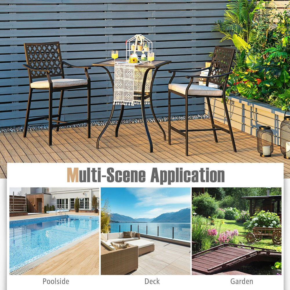 Two patio bar stools with height cushions and armrests, ideal for poolside or garden relaxation.