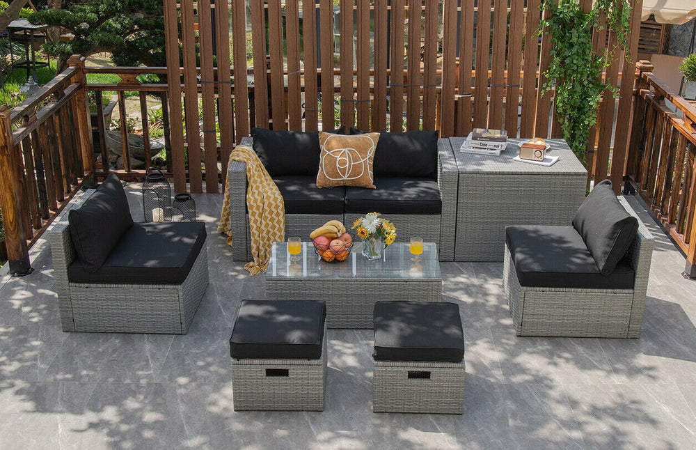 8-piece patio rattan furniture set with black cushions and waterproof cover, ideal for outdoor relaxation and.