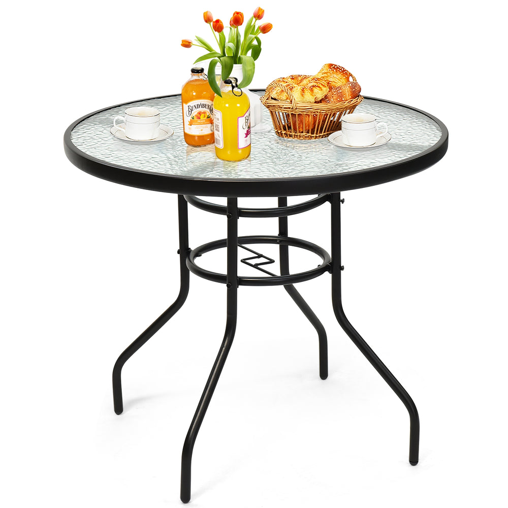 Round 32-inch patio table showcasing a stylish tempered glass top, ideal for outdoor dining with an umbrella hole.