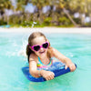 Child enjoying the water on a 41-inch lightweight bodyboard, perfect for summer surfing and outdoor water sports.