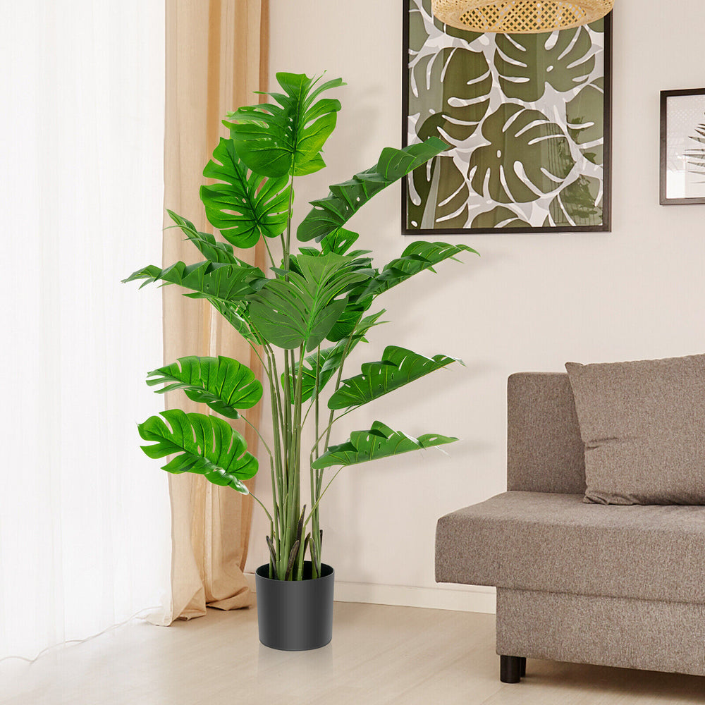 5 feet artificial monstera tree set with 15 large leaves in a solid pot, perfect for indoor or outdoor decoration.