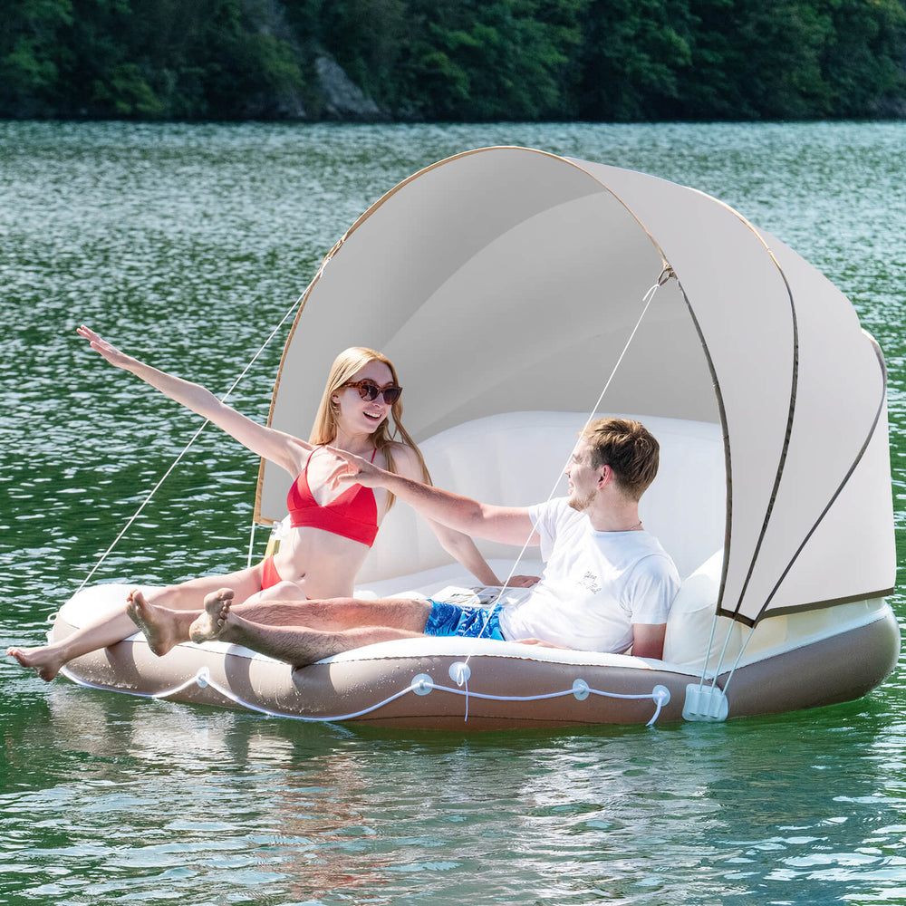 Inflatable pool float lounge with detachable sunshade, cup holders, and ergonomic design for comfortable relaxation on.