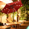Heavy-duty 17.5" square umbrella base stand with bronze finish, designed for secure outdoor umbrella support.