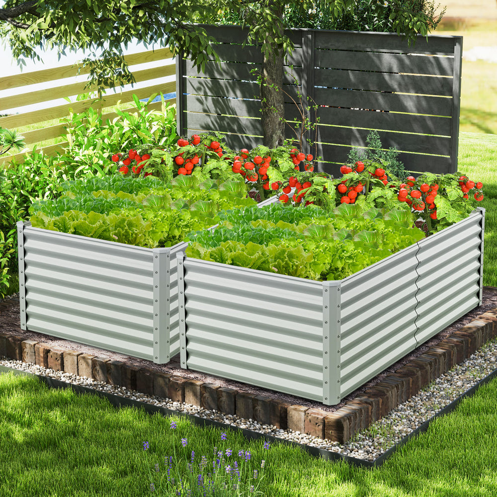 Rectangular 6 x 3 x 2 feet metal raised garden bed in gray, featuring an open bottom design for optimal drainage and.