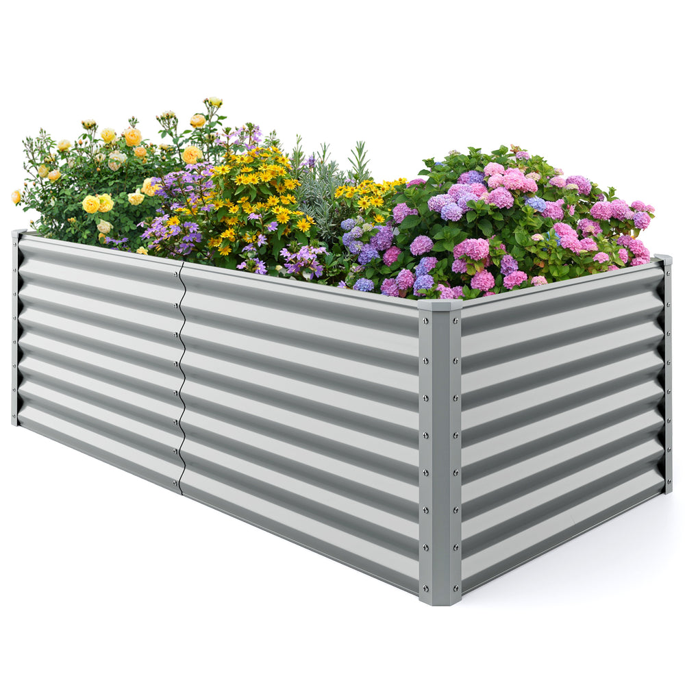Metal rectangular raised garden bed, 6 x 3 x 2 feet, gray, with open bottom design for flowers and vegetables.