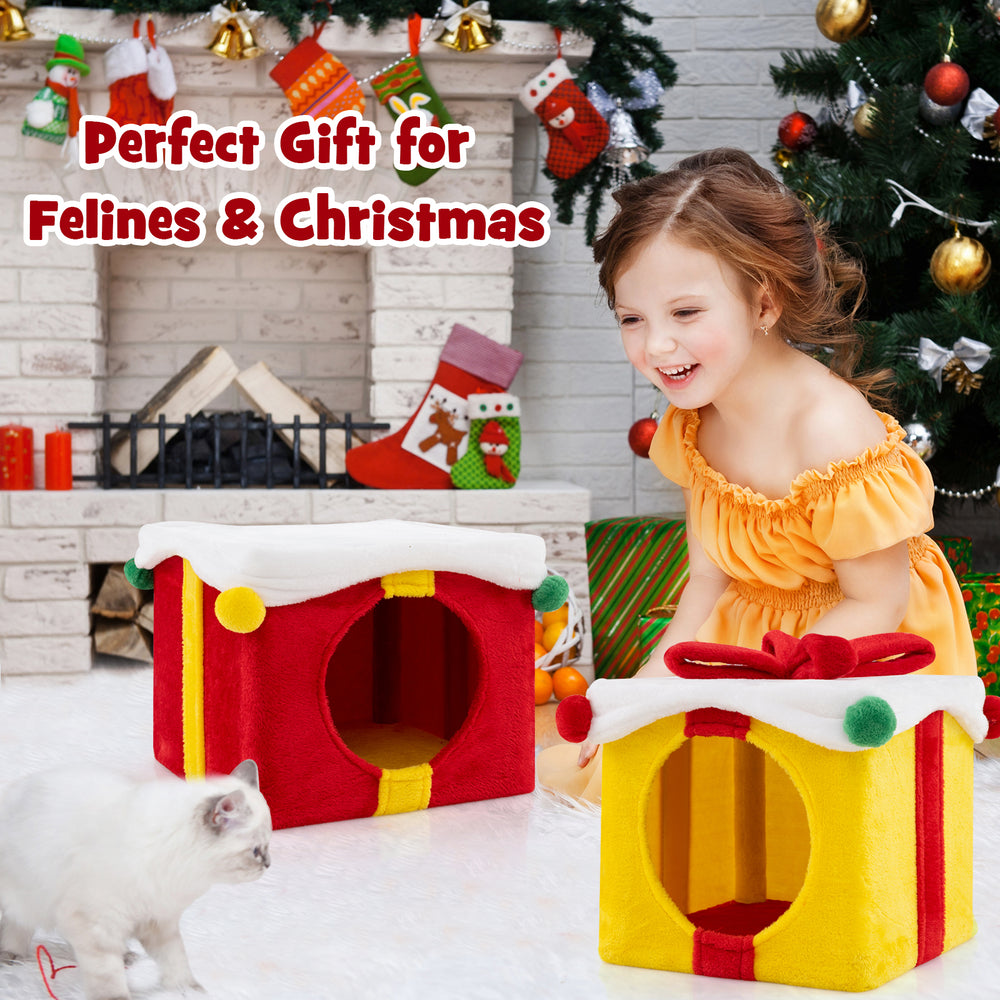 Gift box-shaped Christmas cat house in red and yellow, featuring two condos for cozy feline hideaways and festive decor.