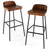 Industrial bar stool featuring a low back and a stylish wood seat, designed for comfort and stability at kitchen bars.