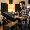Professional audio rack mount with adjustable crossbars, designed for home studios and live performances, featuring.