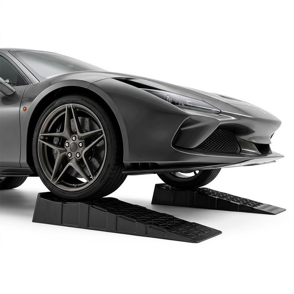 Low-profile car ramps with a 2.5"/6.5 cm lift, 22,000 lbs capacity, ideal for low-chassis vehicle maintenance.