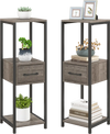 3-tier gray metal plant stand with drawer and display shelf, perfect for books and ornaments in any corner space.