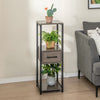 Three-tier gray metal plant stand with drawer, featuring a robust frame and faux wood grain, perfect for displaying.