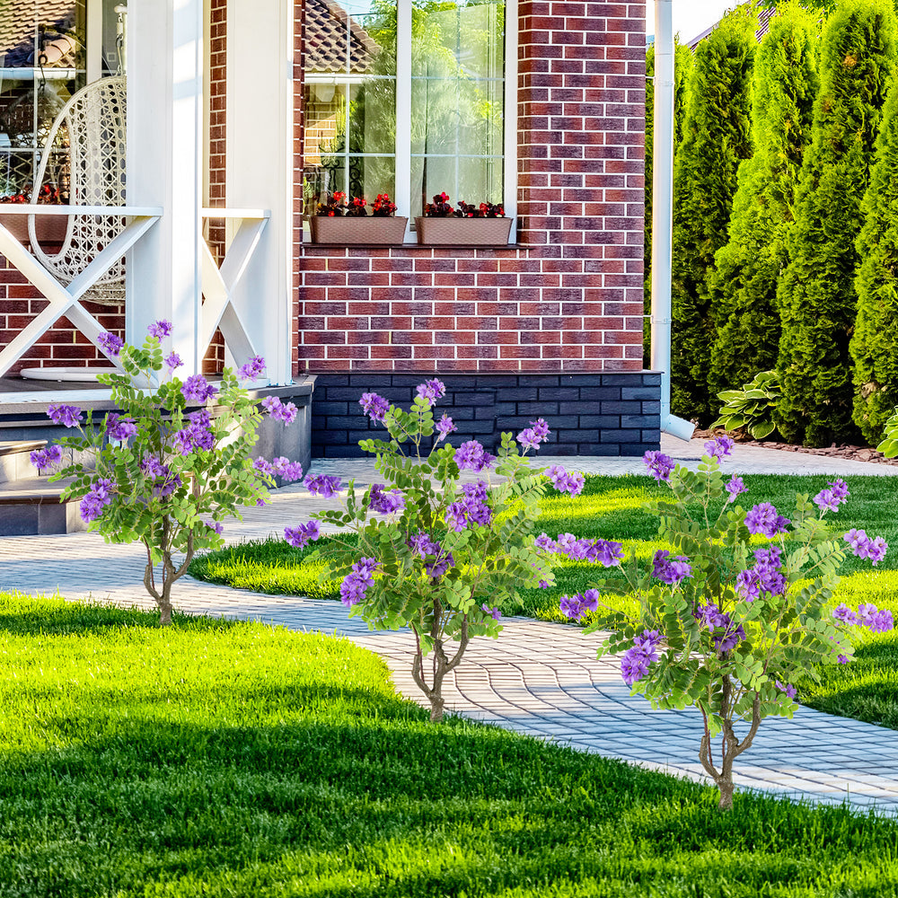 Artificial locust flower trees with purple blooms, 39 inches tall, perfect for enhancing outdoor spaces.