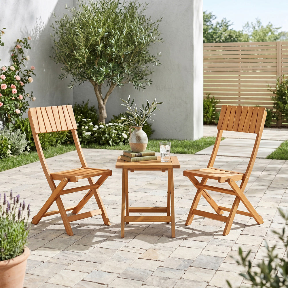 Two sturdy wood folding chairs with slatted backrests and a small table, perfect for outdoor garden or patio use.