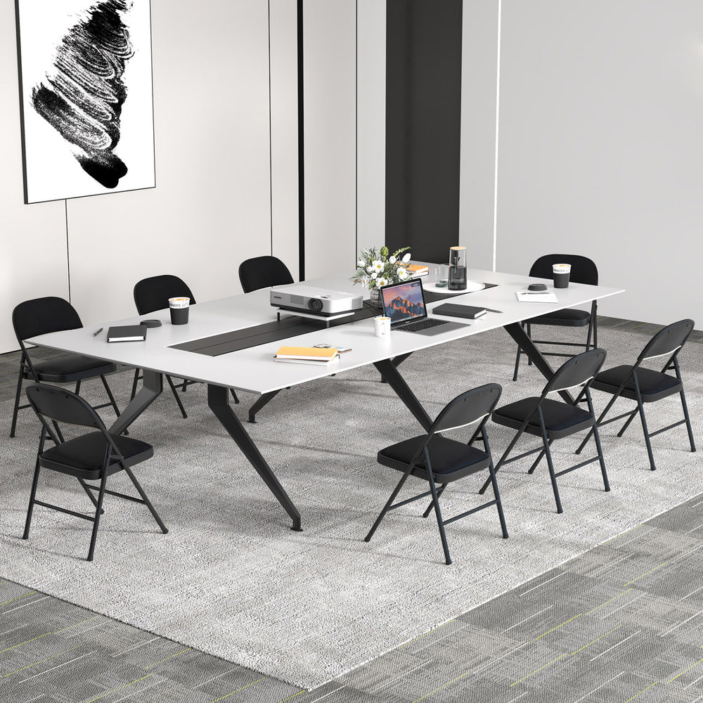 Folding chairs with a metal frame and PVC leather, featuring a curved backrest, ideal for meetings and events.