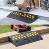 Driveway threshold ramps with textured surface, reflective patterns, and 5/6 inch rise for safe vehicle passage.