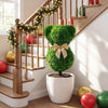 Adorable teddy bear topiary tree with golden bow, made of sun-resistant faux boxwood for indoor or outdoor decor.