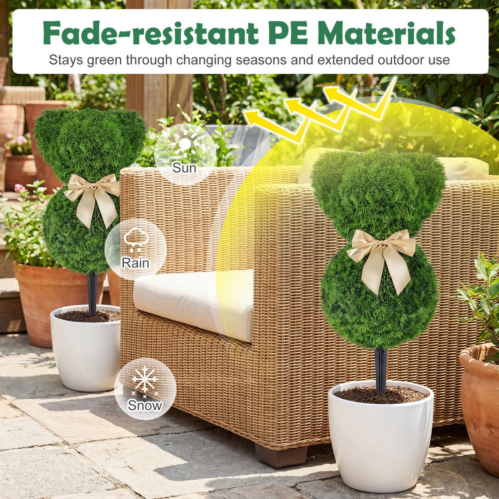 Teddy bear topiary trees with golden bows, made of fade-resistant PE materials, perfect for outdoor spring displays.