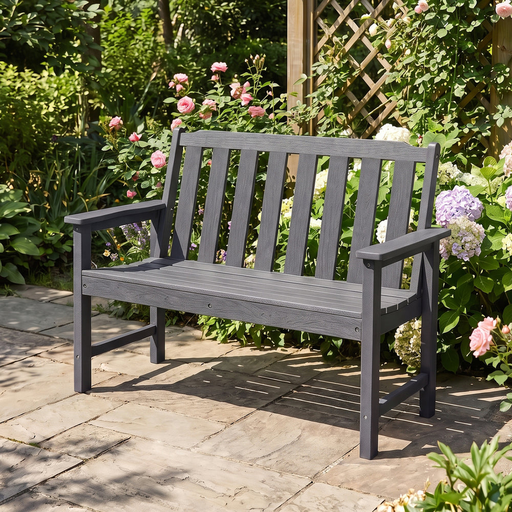 Gray 2-person outdoor garden bench with backrest and armrests, made from weatherproof HDPE, ideal for patios and gardens.