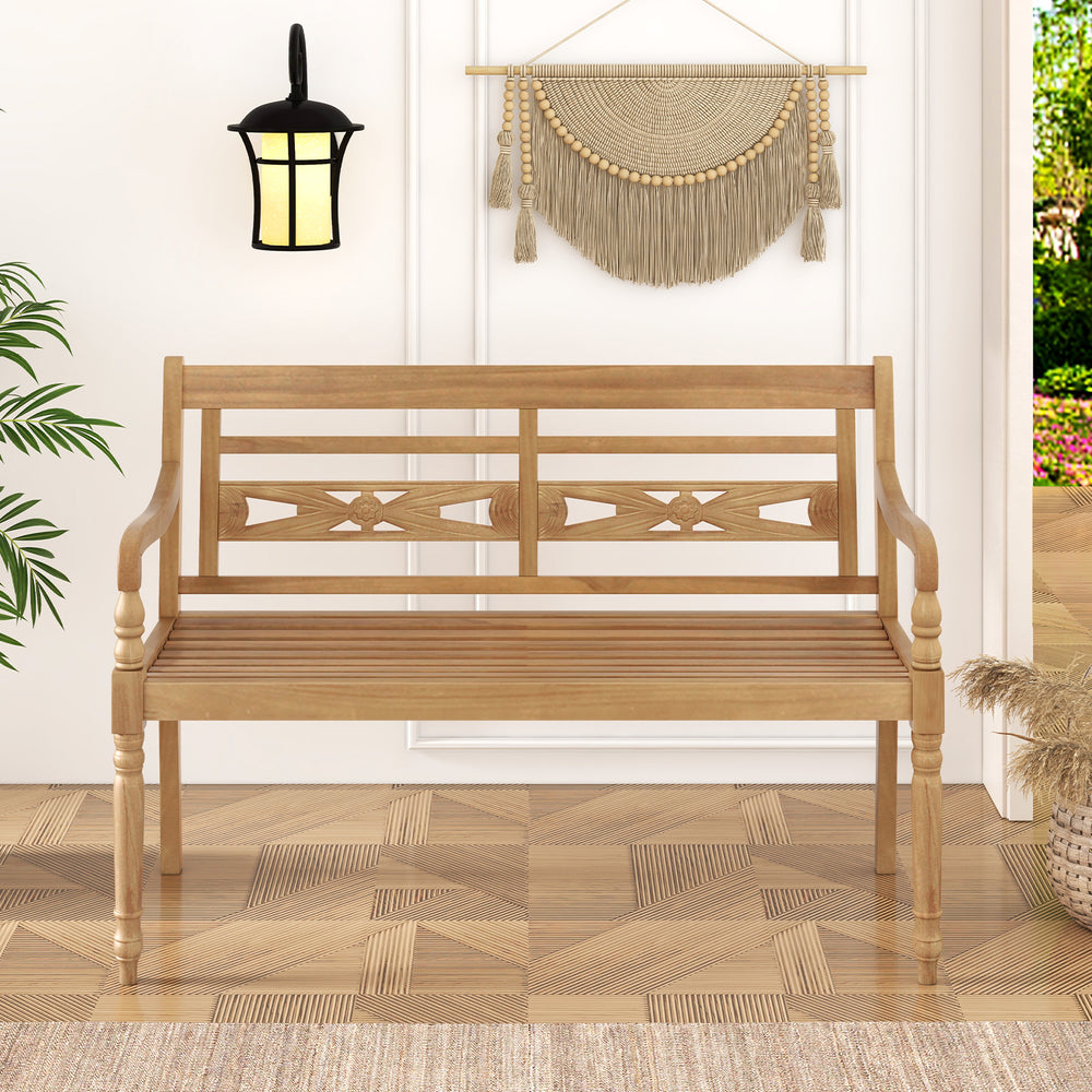 Teak wood patio bench with wide backrest and curved armrests, ideal for outdoor relaxation and seating up to 2 people.