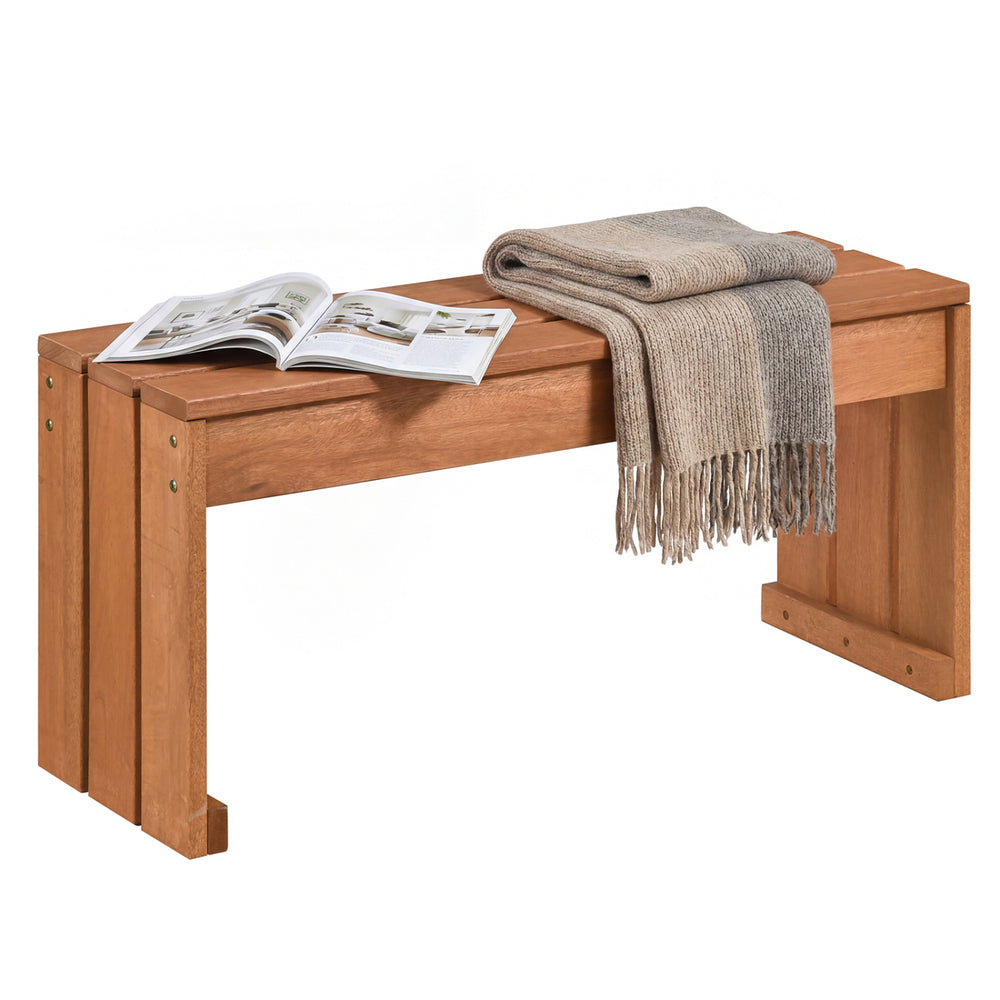 Outdoor garden bench with solid wooden frame, natural wood grain, and a cozy blanket, perfect for backyard use.